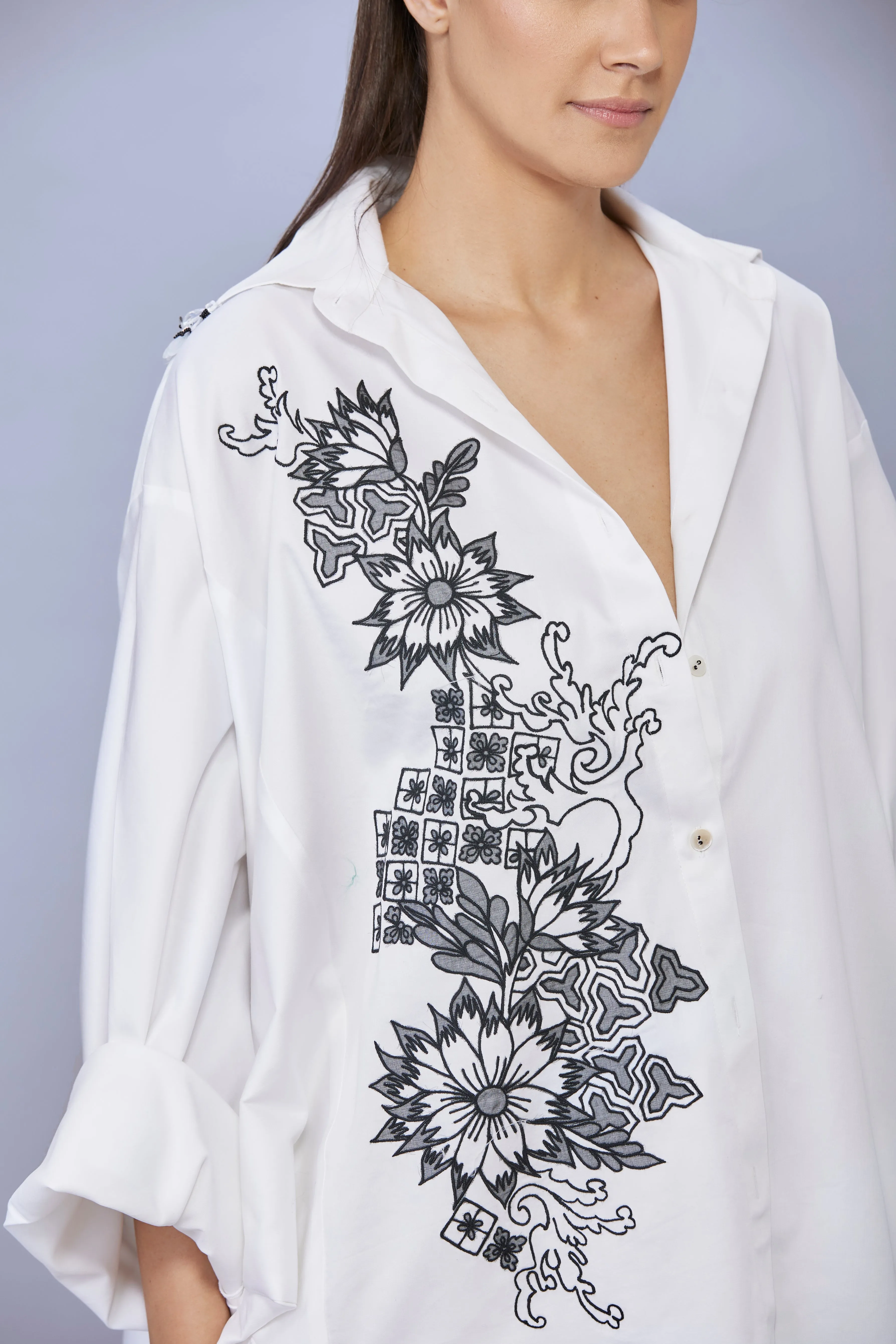 White cotton batwing shirt with black thread embroidery